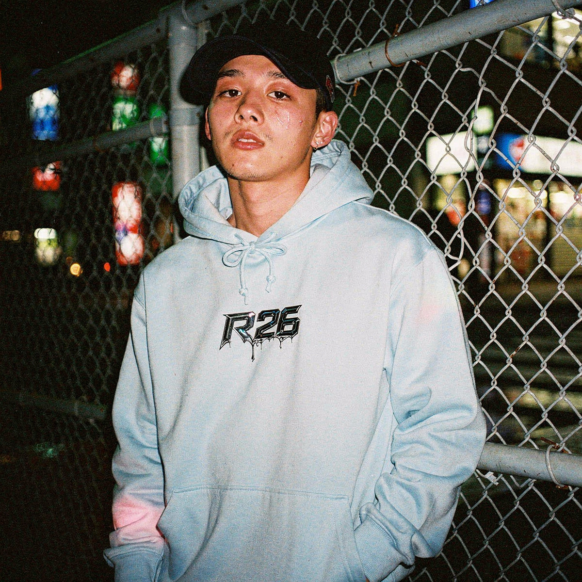 Streetwear R26 logo hoodie featuring minimal drip graphic